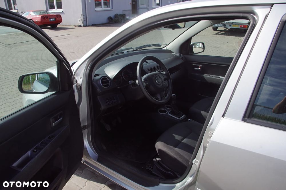 Auto na części - Mazda 2 DY Lift 1.4 CITD 67 KM F6JA 2N1R-7F096-AB 2006R Silnik Skrzynia Drzwi Szyba Lusterko Maska Klapa Lampa Zderzak Deska Kokpit Sterownik Moduł - 9