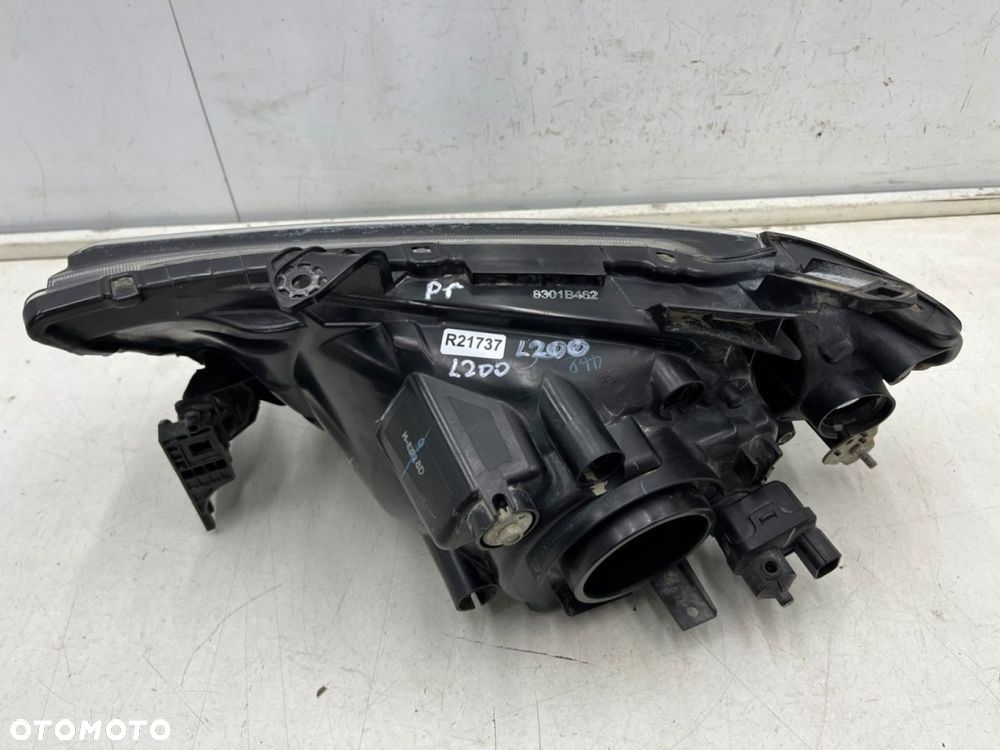 Lampa reflektor Mitsubishi L200 KA KB 05-10r. PRAWA przednia H4 oryginalna prawy przód EU 8301b462 - 12