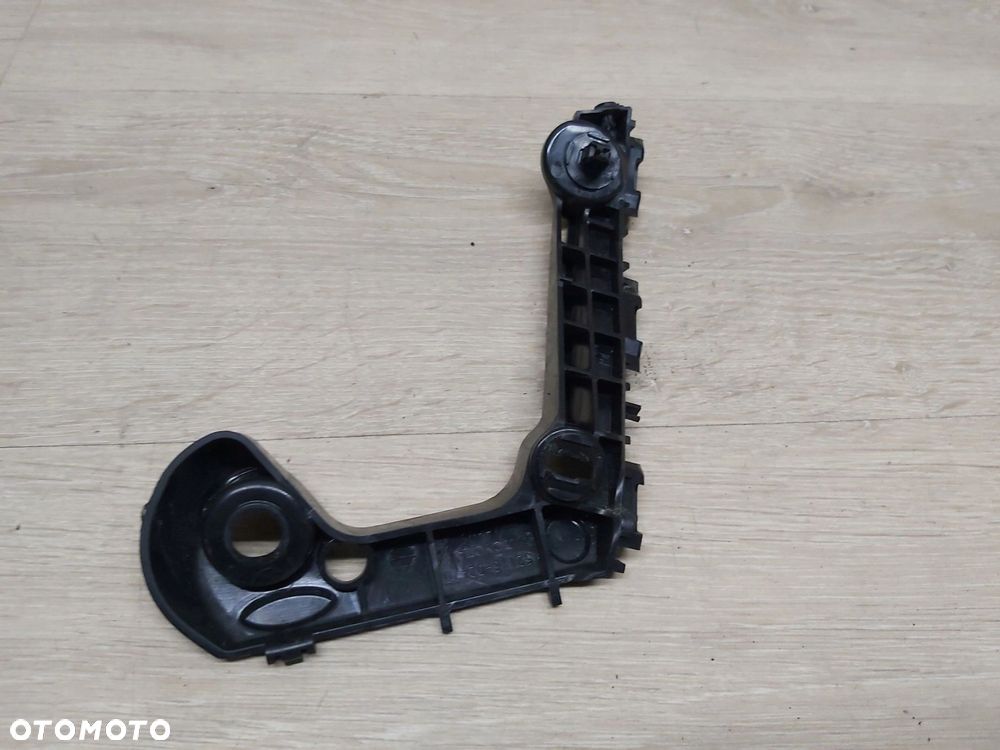 TOYOTA Corolla E21 ślizg zderzaka lewy przód mocowanie 52116-02470 - 2