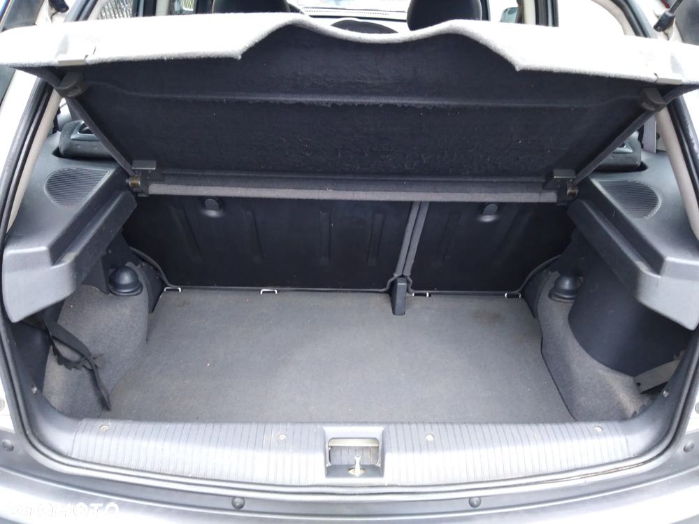 Opel Corsa 1.2 16V NJoy - 11