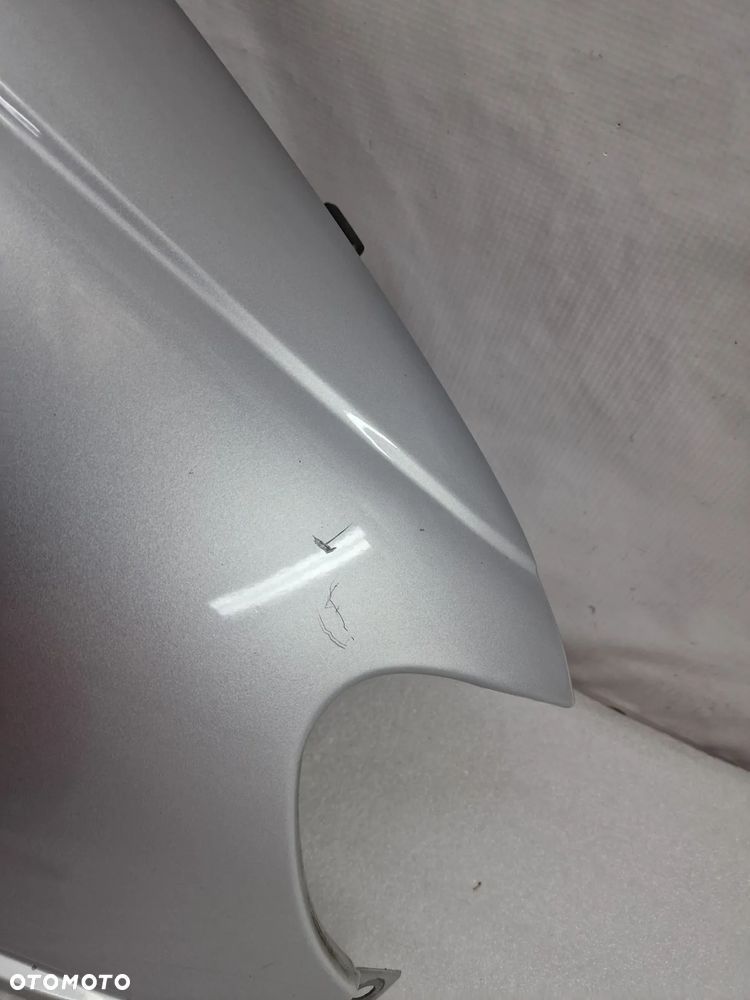 OPEL OMEGA C 99-02 SREBRNY PRAWY BŁOTNIK PRZEDNI PRZÓD , NR AUKCJI BŁ179 - 12