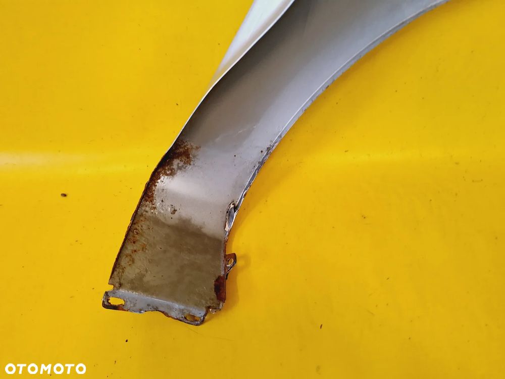 BŁOTNIK LEWY PRZÓD PRZEDNI OPEL CORSA D 3D HB 06-11 LAK: Z157 NR652 - 11