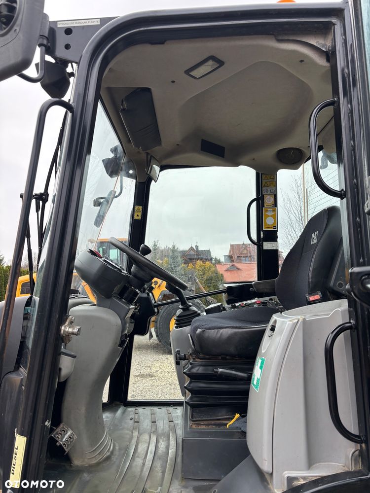 Caterpillar 907H2 rekin 4x4 łyzka dzielona z niemiec - 14