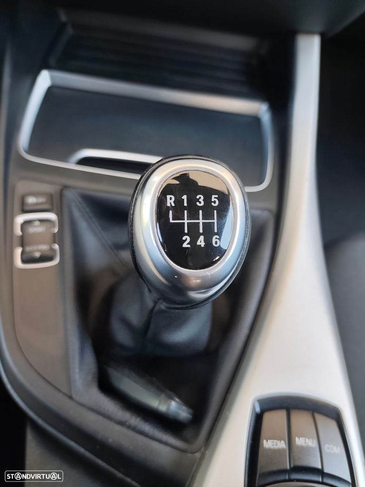 BMW 116 i Advantage — fotografia 15