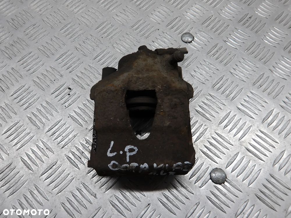 SKODA OCTAVIA I HB 1.6B ZACISK HAMULCOWY LEWY PRZEDNI - 1