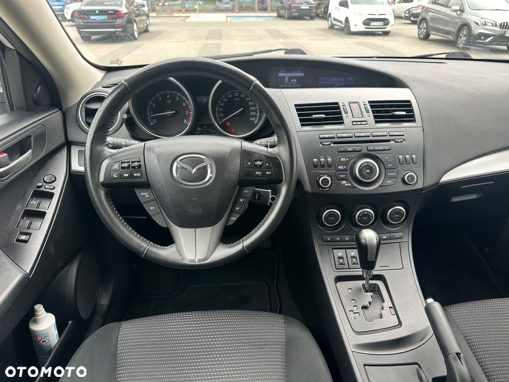 Mazda 3 2.0 Exclusive + - 12