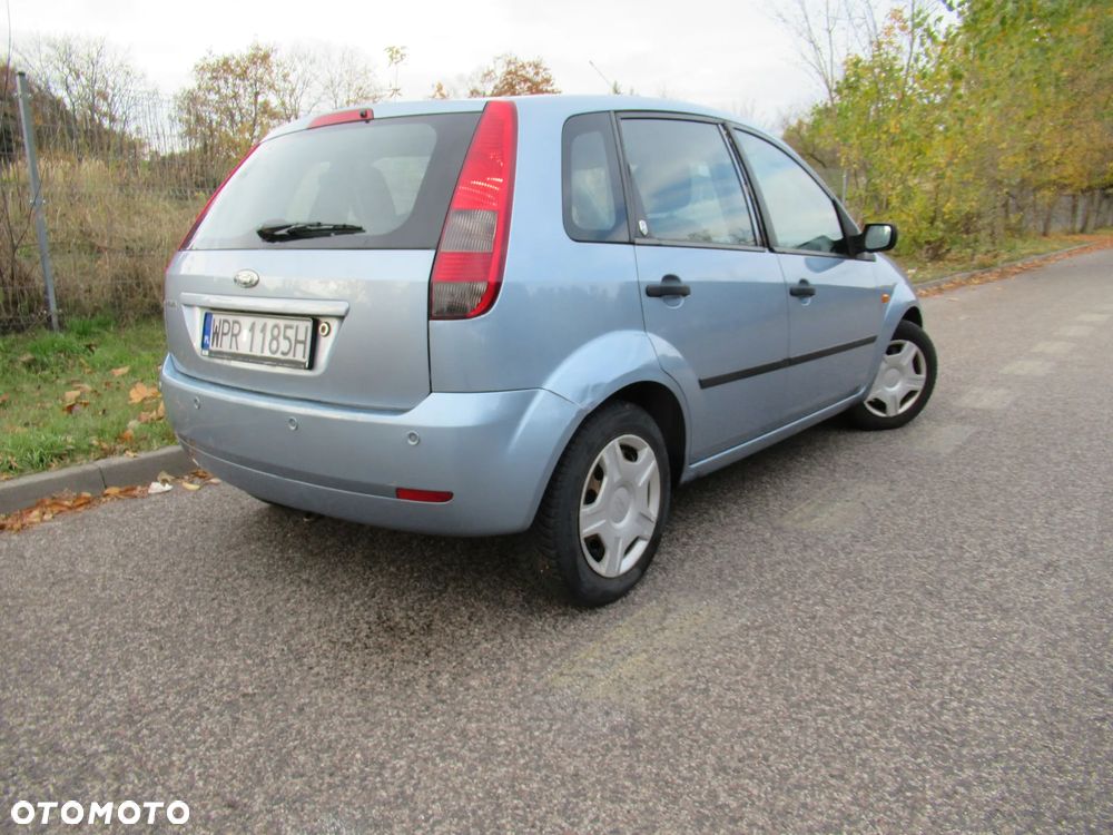 Ford Fiesta 1.4 Ghia - 9
