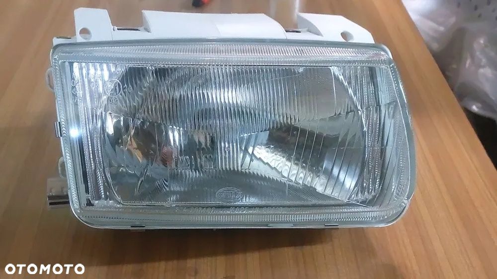 Reflektor prawy pasuje do Volkswagen Polo 1994r