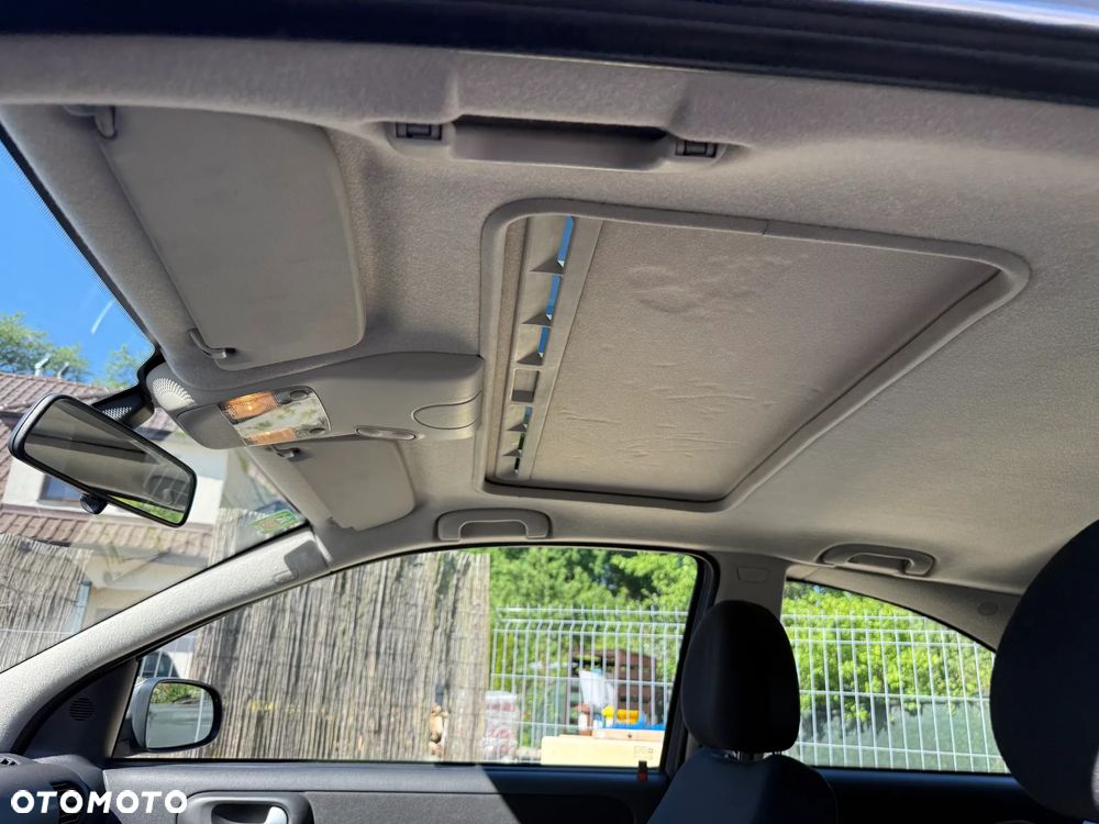 Opel Corsa 1.4 16V Sport - 11