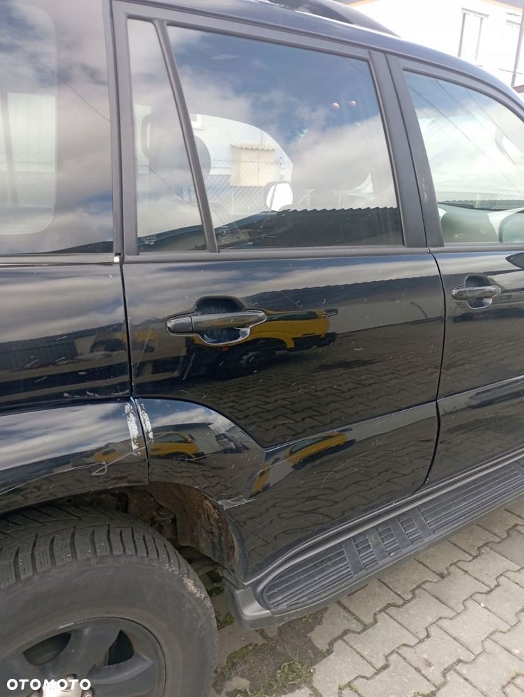 TOYOTA LAND CRUISER 120 DRZWI PRAWE TYŁ TYLNE GOŁE 202 - 1