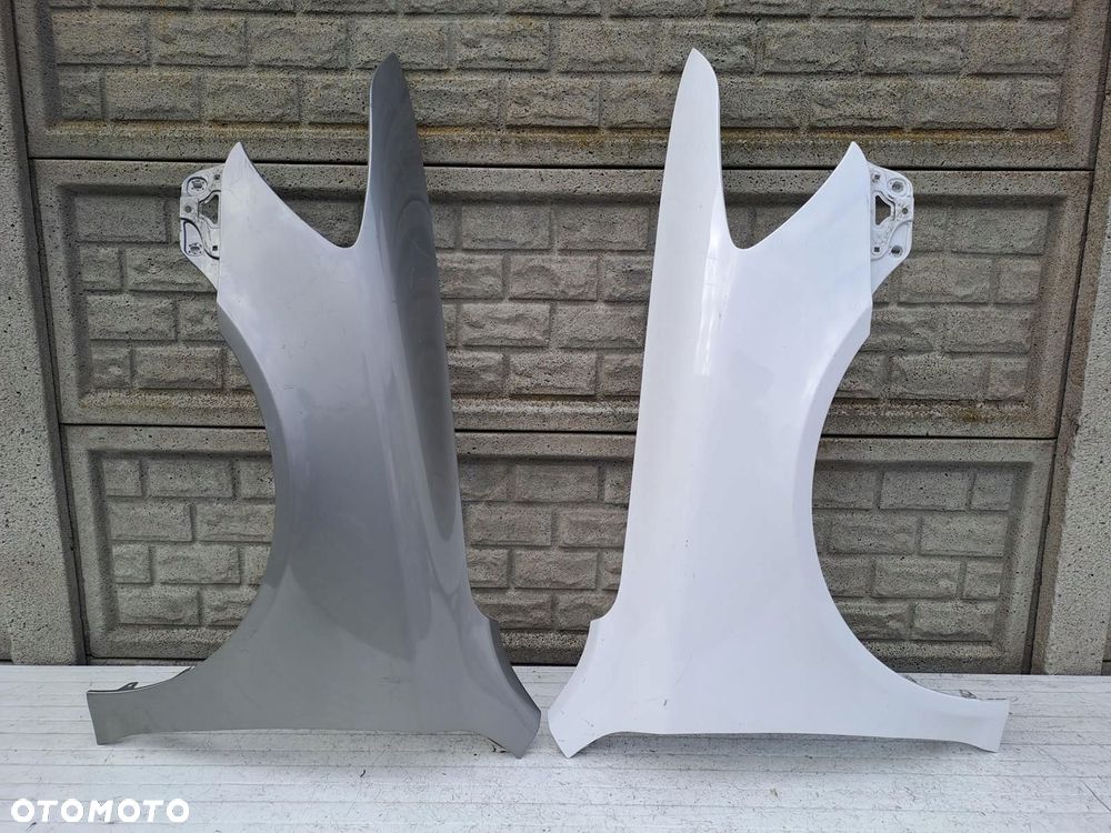 skoda octavia ii 2 lift 08-13 błotnik lewy prawy przód oryginał - 1