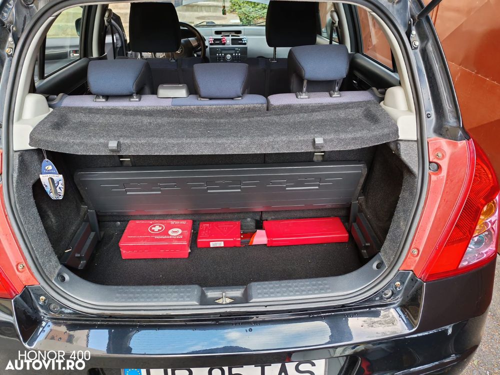 Suzuki Swift 1.3 GLX - 12