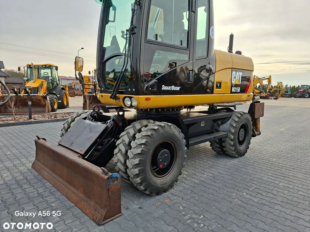 Caterpillar CAT M315D rok 2012 - 12