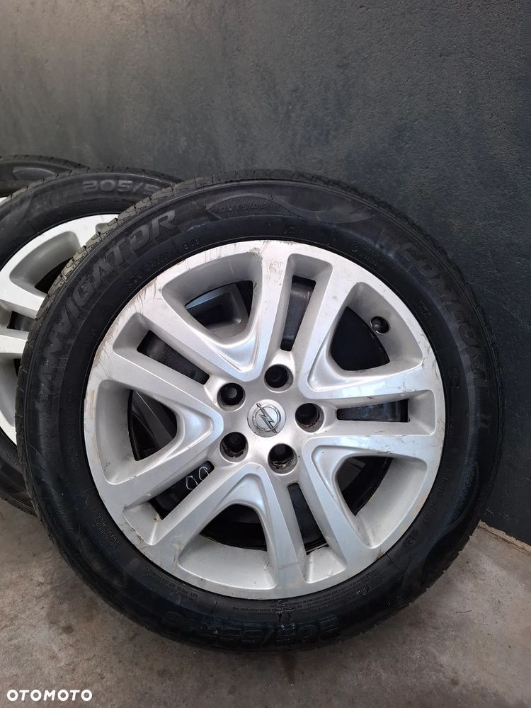 Felgi z kołpakami nowe opony Opel Astra K 5x105 - 2