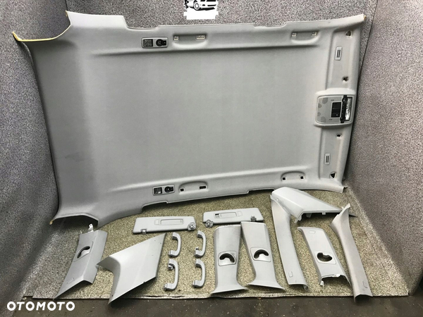 Podsufitka lampki slupki sloneczniki plastiki szara ladna BMW E70 X5 KPL