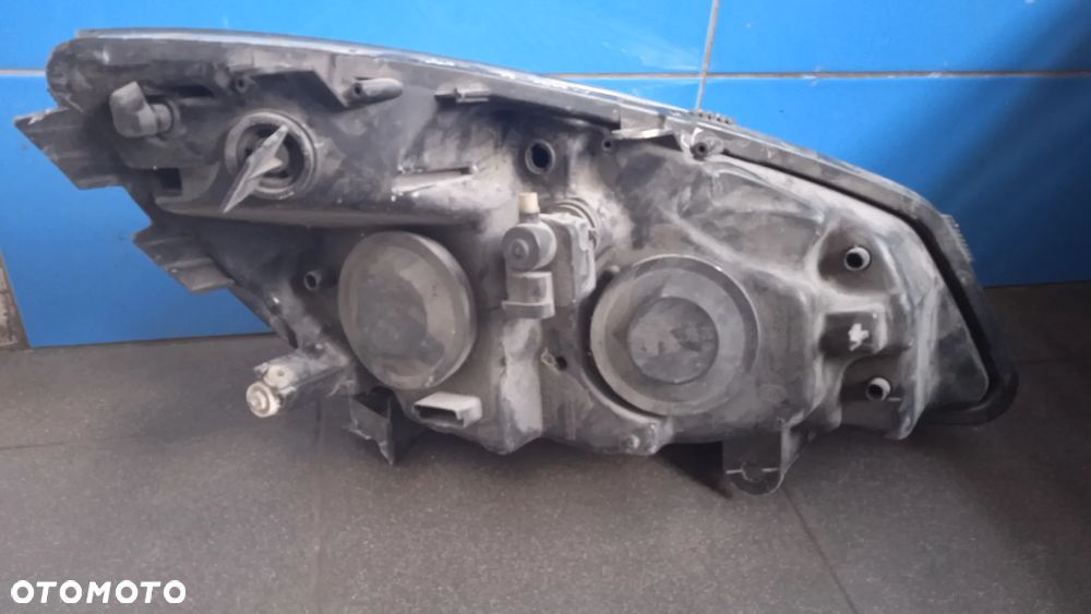 Lampa przód lewa prawa Renault Scenic II Hella - 4