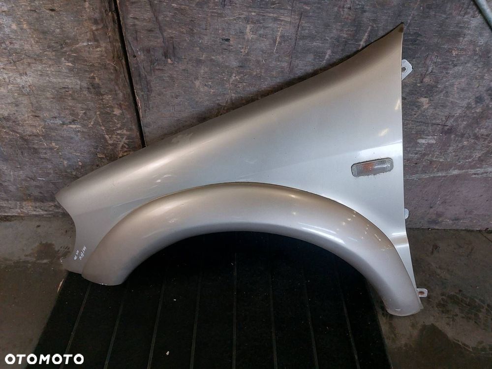 BŁOTNIK LEWY PRZÓD MERCEDES ML I W163 - 1