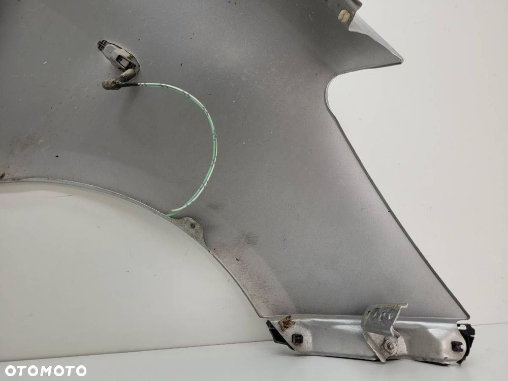 BŁOTNIK PRZÓD LEWY TOYOTA YARIS II 3D 2006 3 DRZWI EUROPA - 10
