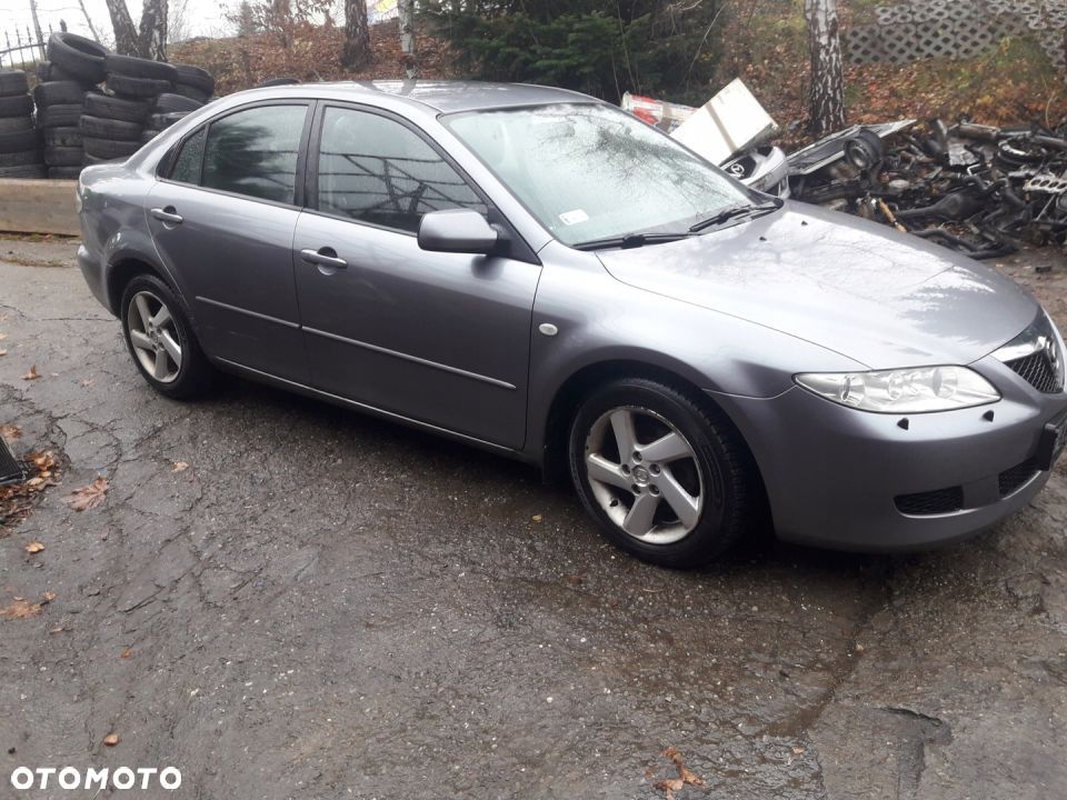 Mazda 6 02-07 Maska lampa zderzak pas atrapa 29Y - 4