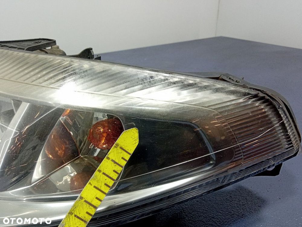 RENAULT LAGUNA II REFLEKTOR LEWY LAMPA H7 EU 7701048927 - 7