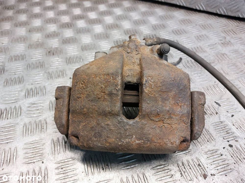 TARCZE HAMULCOWE PRZÓD + KLOCKI + ZACISKI VOLKSWAGEN PASSAT B6 - 9