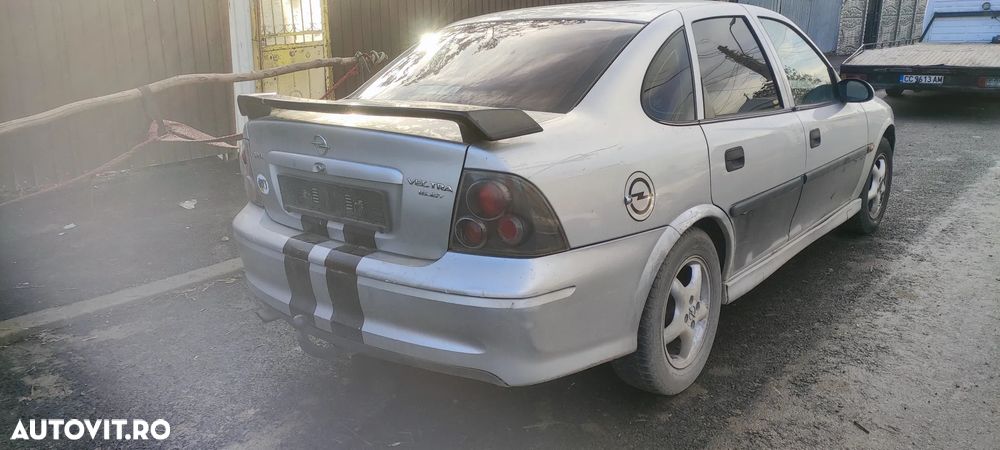 dezmembrez opel vectra B 1.6 74kw si1.8 85kw benzina - 3