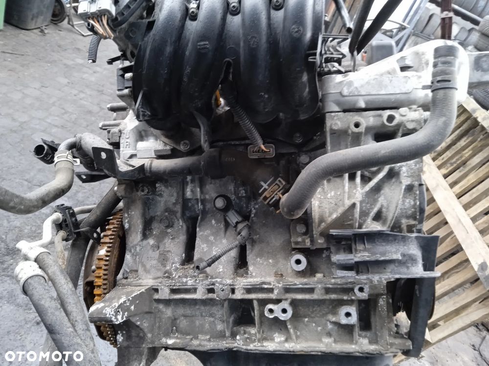 KOLEKTOR SSĄCY PEUGEOT 206+ CITROEN C3 1.1 8V HFZ - 1
