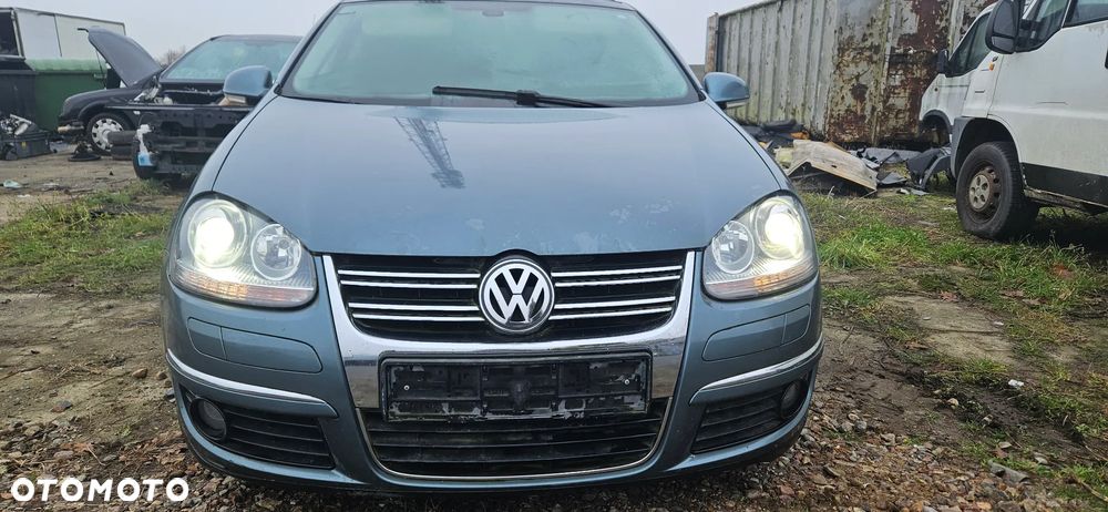 Maska pokrywa VW Golf 5 V kombi 2009r LA6R - 1