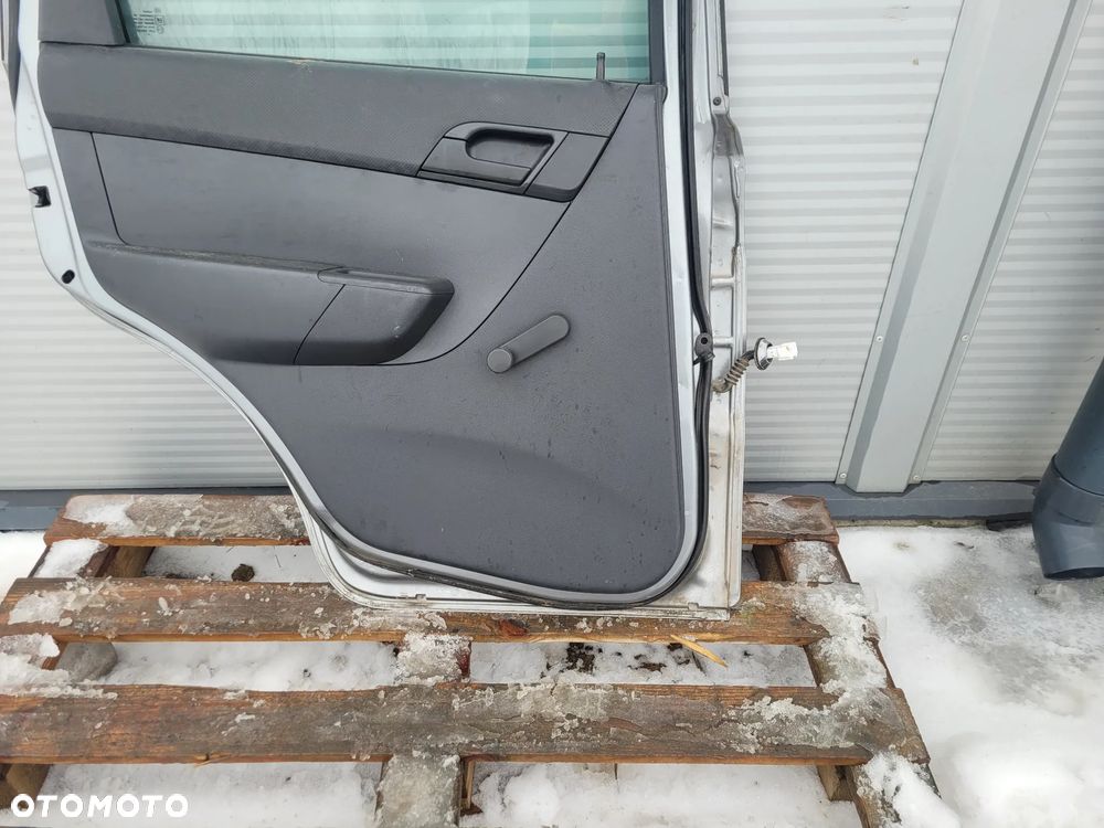 Chevrolet Aveo II 09r T255 5d hb Drzwi lewy przod - 12