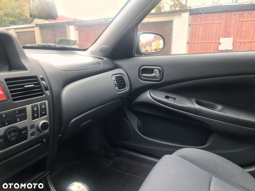 Nissan Almera - 14