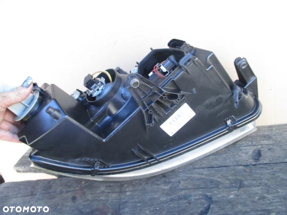 Lampa lewa PASSAT B5 LIFT HELLA EUROPA - 5
