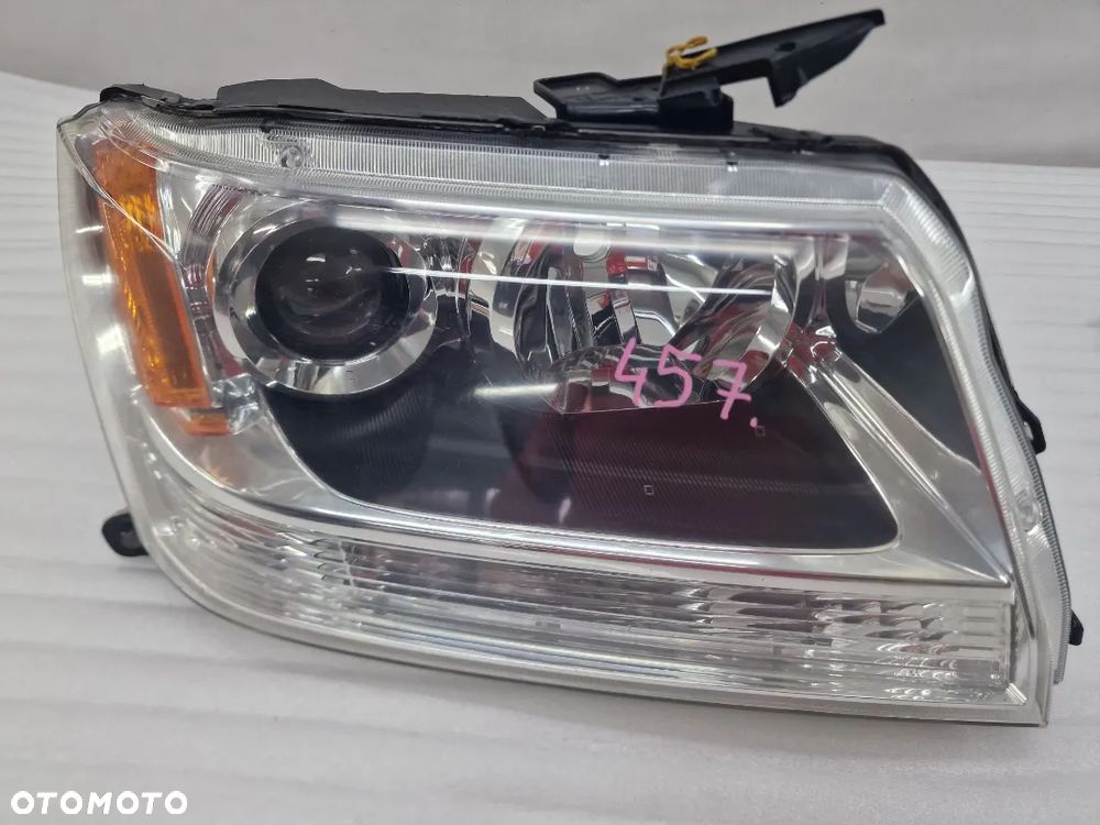 SUZUKI GRAND VITARA II 06- USA PRAWA LAMPA PRZEDNIA PRZÓD , NR KOITO 100-59079 , NR AUKCJI LL457