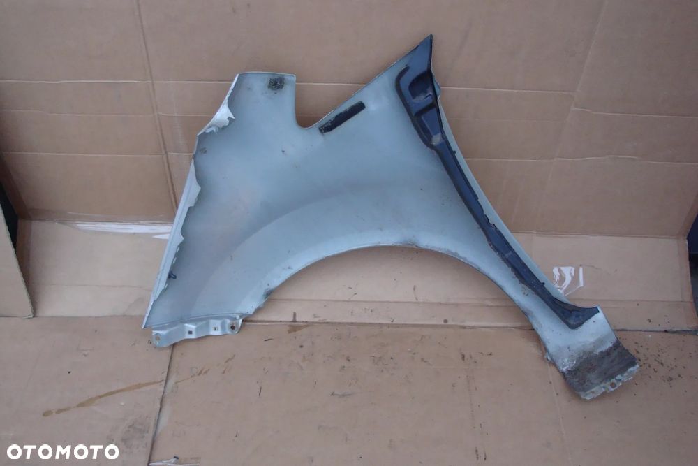 KIA VENGA blotnik prawy przedni lak QU - 2