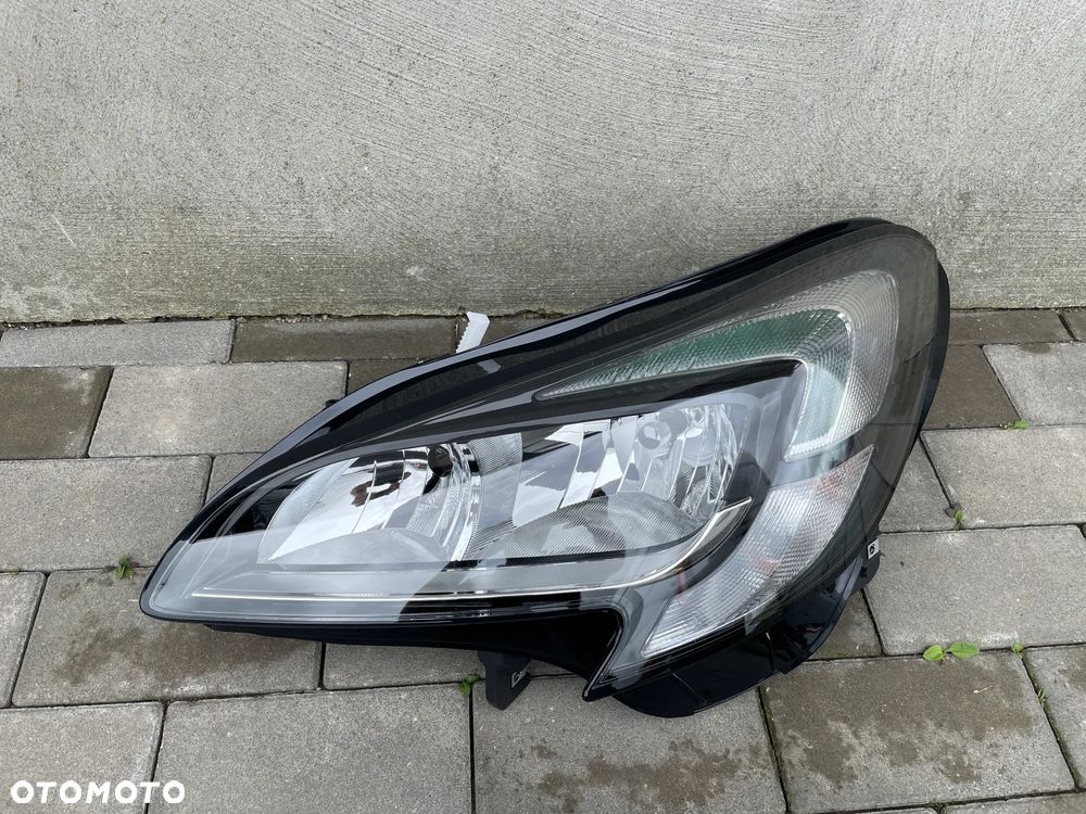 LAMPA PRZEDNIA LEWA OPEL CORSA E  2014-- NOWA - 1