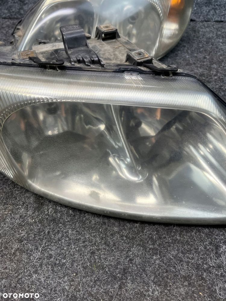 chrysler grand voyager IV lampa przód prawa  lewa OE europa - 4