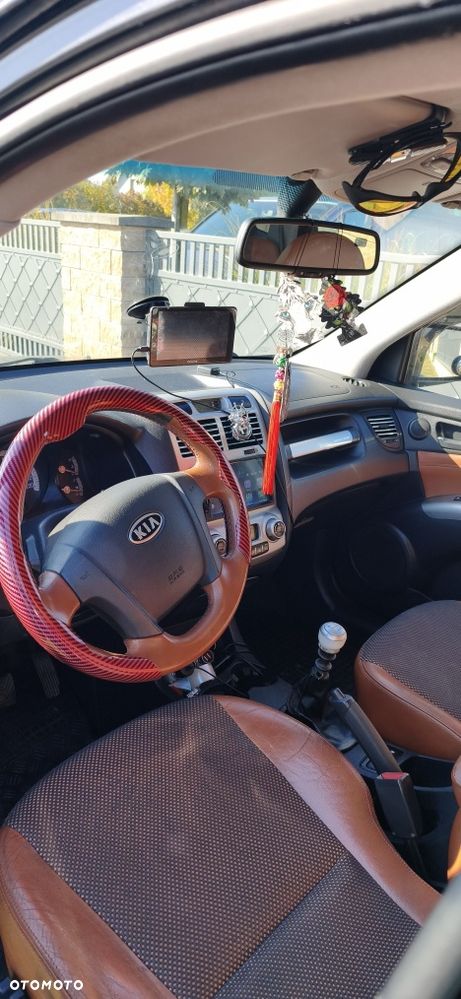 Kia Sportage - 4