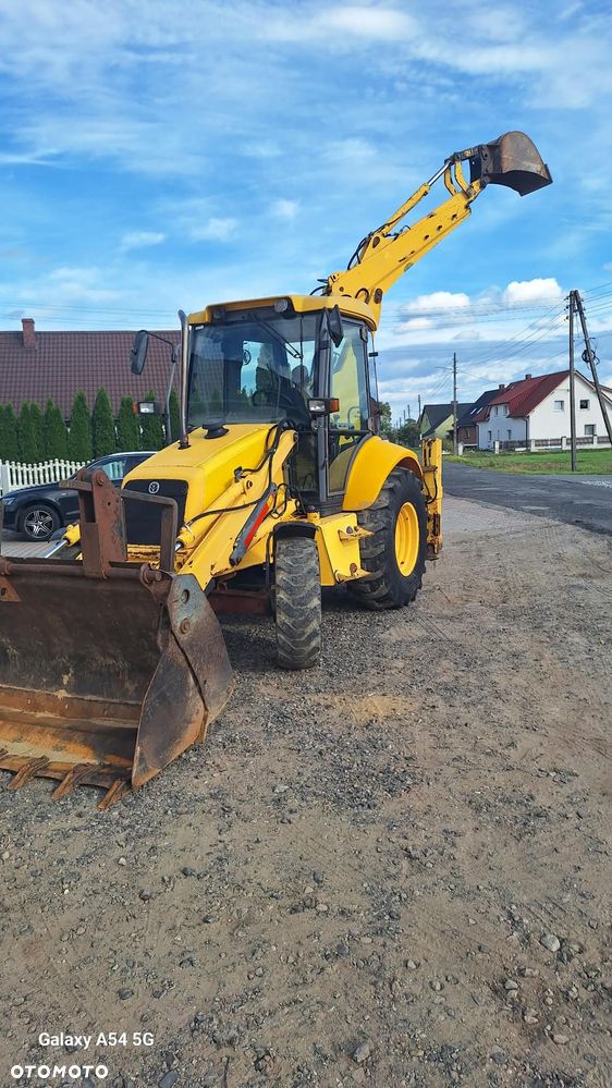 New Holland LB 110 - 6