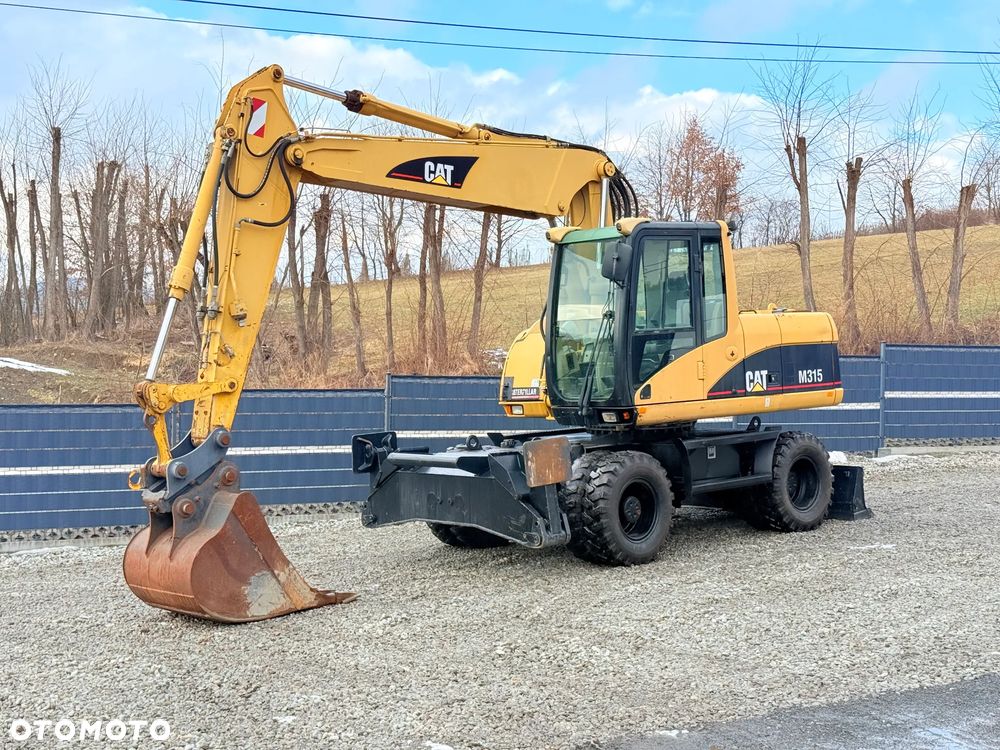 Caterpillar CAT M315C  CATERPILLAR SPROWADZONY  Bardzo Dobry Stan - 1