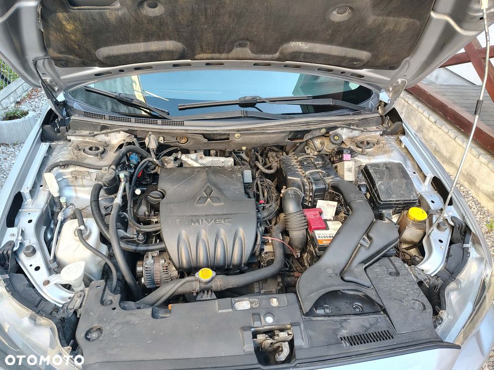 Mitsubishi Lancer 1.5 Inform - 12