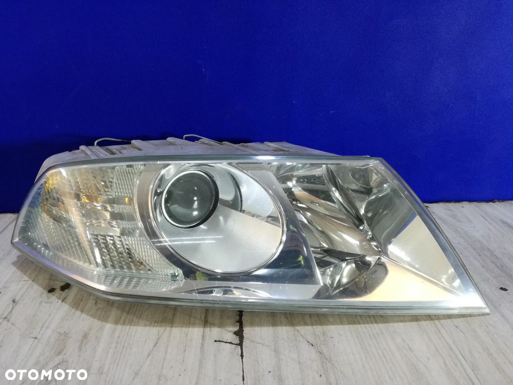 Skoda Octavia II 2 1Z lampa reflektor prawa przód Europa 04/08 - 1