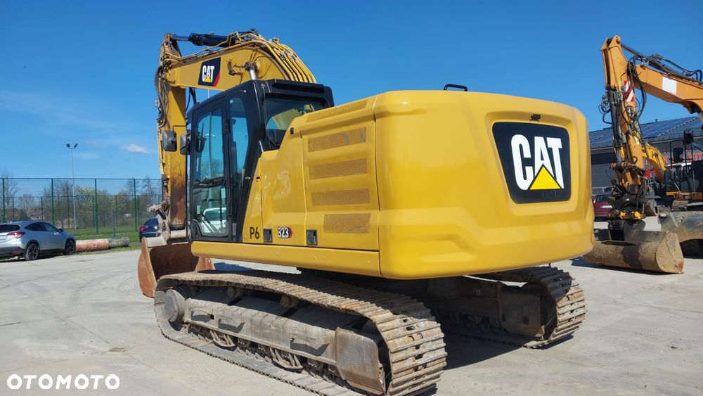 Caterpillar 323 - 12