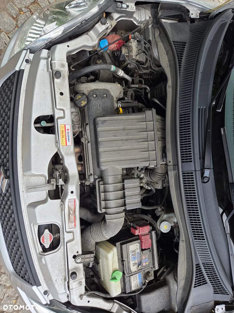 Suzuki Swift 1.3 Club - 11