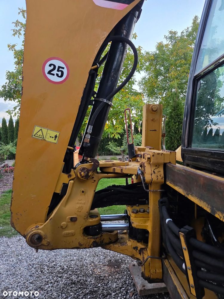 Caterpillar CAT 428E - 7