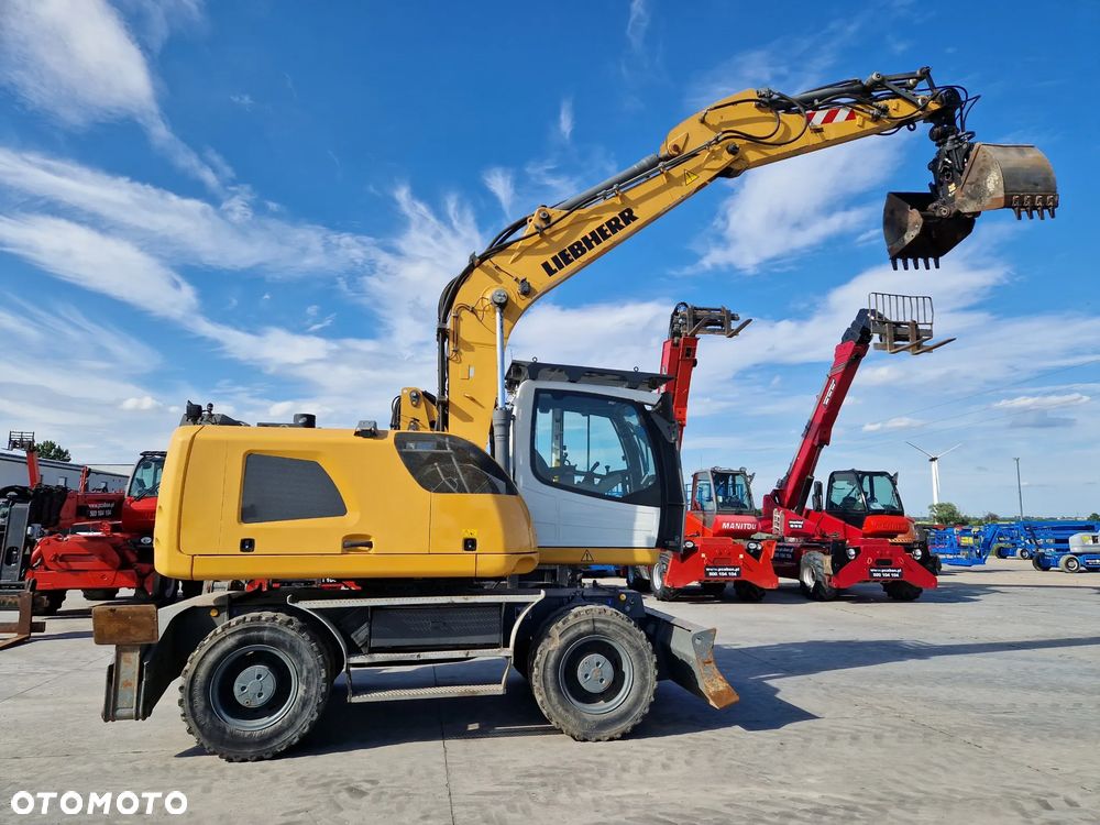 Liebherr A 914 Litronic jak TEREX CAT SENNEBOGEN M497 - 23
