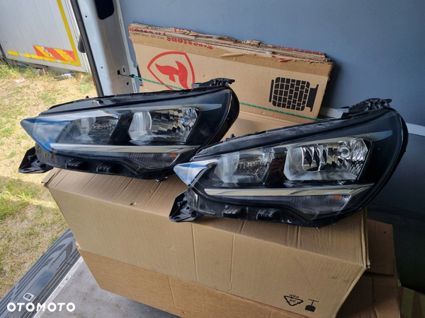 OPEL CORSA F LAMPA ZWYKŁA LEWA PRZÓD PRZEDNIA ORYGINAŁ 39162648 9829465580