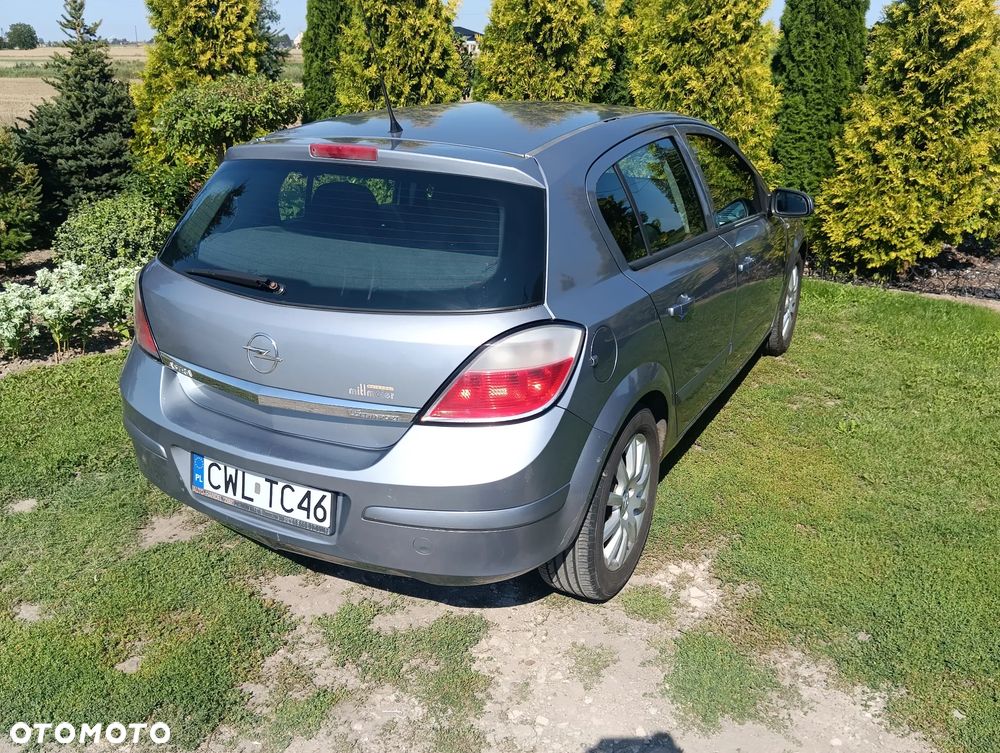 Opel Astra 1.6 Cosmo - 8