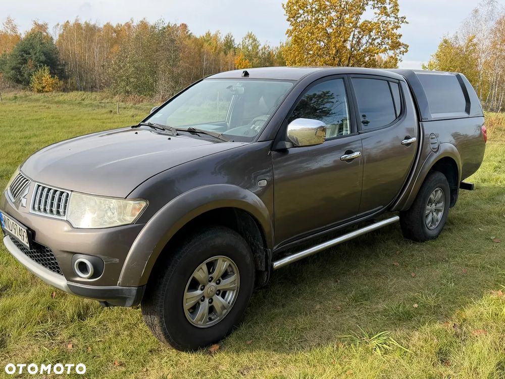 Mitsubishi L200 2012 photo 2