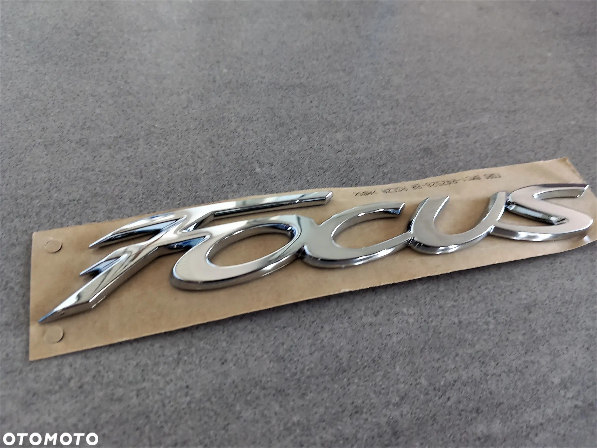 Emblemat znaczek Ford tył napis Focus 2011-2015, 2014-2019 1765113 - 2