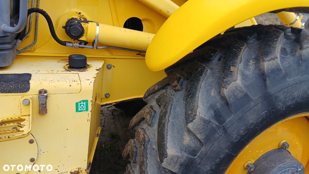 New Holland LB 115 - 17