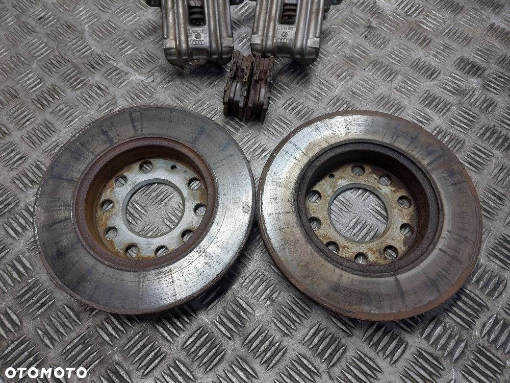 TARCZE HAMULCOWE TYŁ + KLOCKI + ZACISKI AUDI A4 B7 2.0 TDI - 3